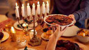 Hanukkah Celebration with Plate of Latkes and Menorah