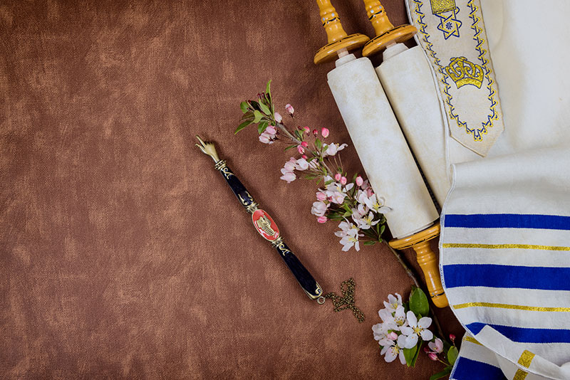 Torah with Tallit and flowers
